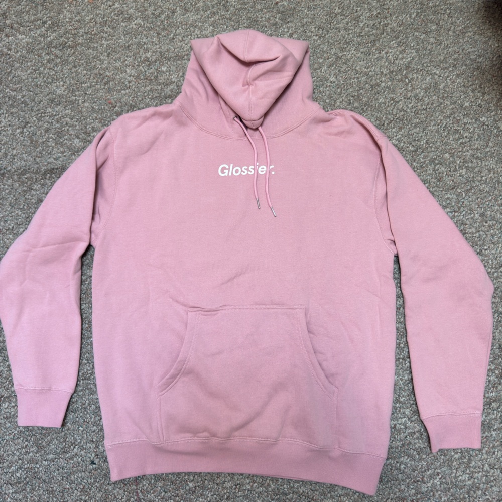 Glossier “Original Pink Hoodie” in size large.
